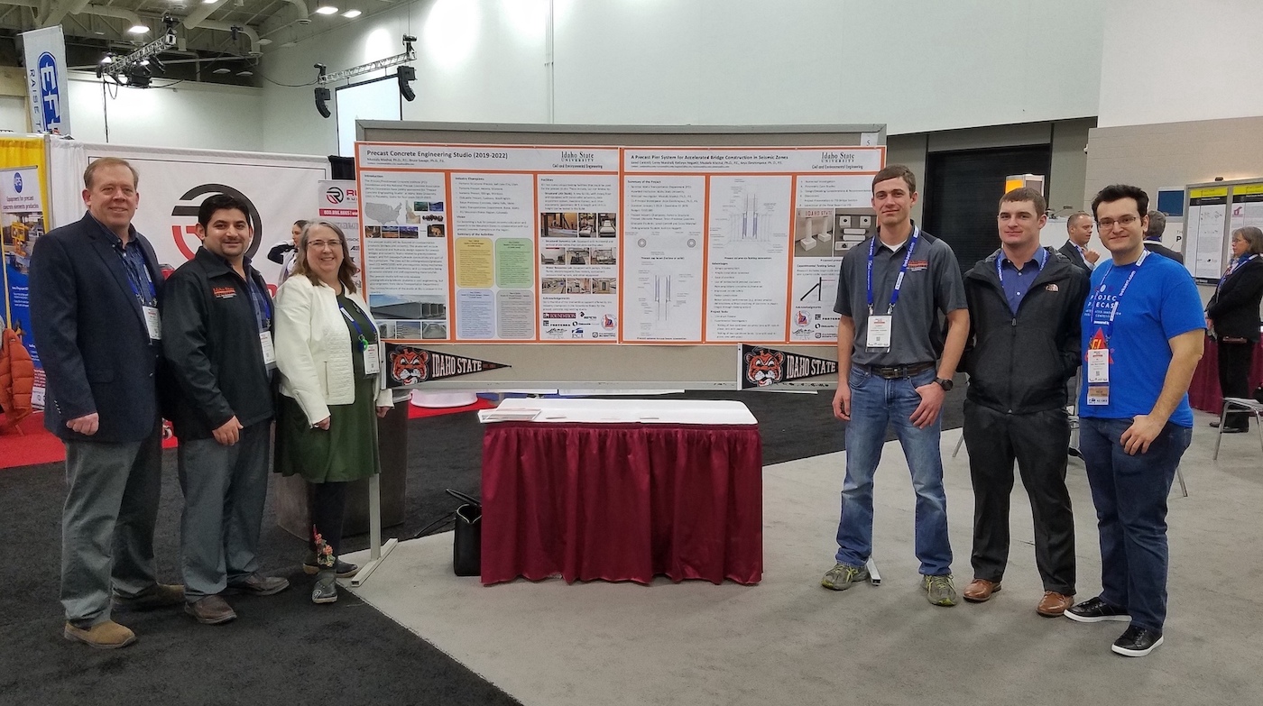 ISU civil and environmental engineering faculty and students with an industry representative at a conference.