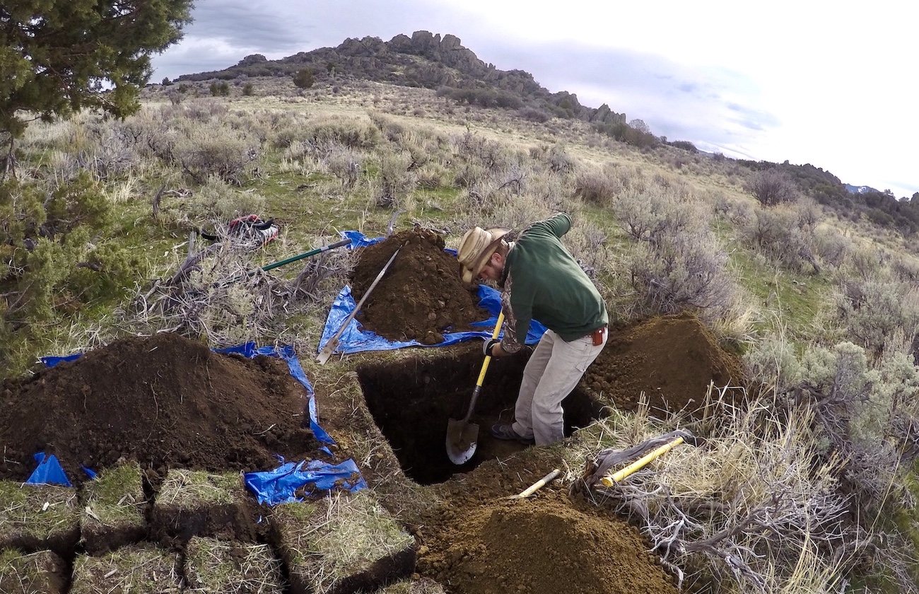 Dave Patton digging soil pit in desert at Reynolds Creek CZO.