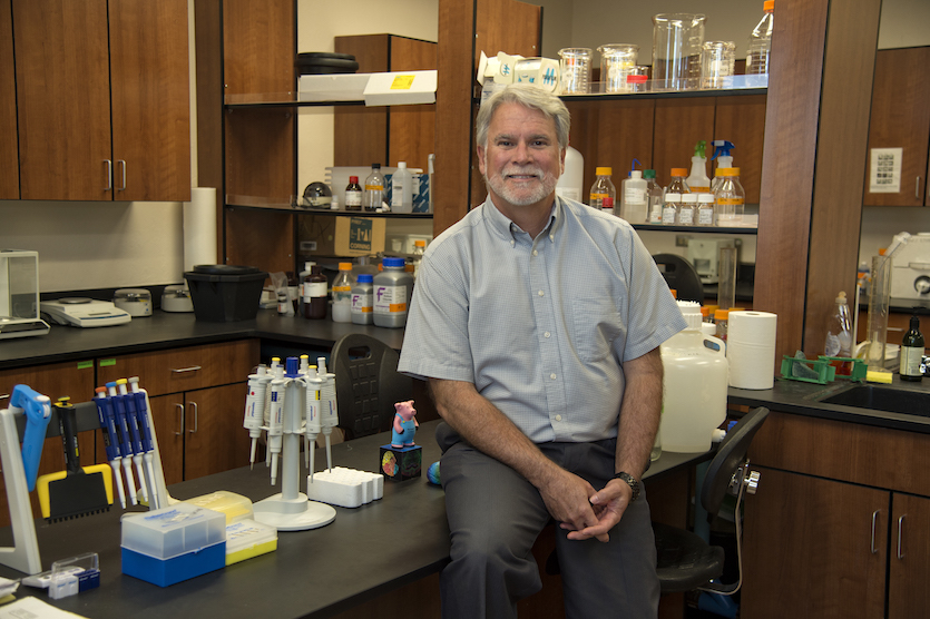 A photo of Mark Austin in his office.