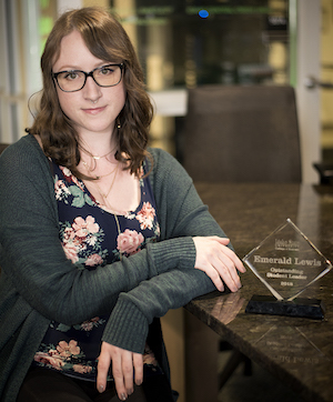 Photo of Emerald Lewis with her trophy