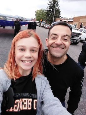 Photo of Joe Hughes and a friend at 2017 Homecoming Parade