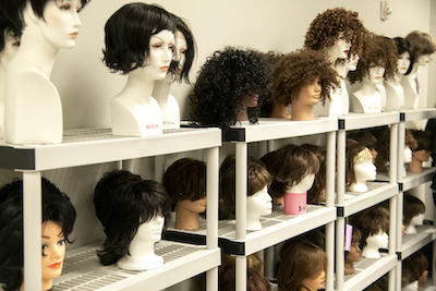 Some of the wigs at the Hair Loft