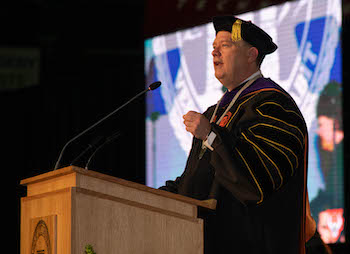 President Satterlee delivering remarks at commencement.