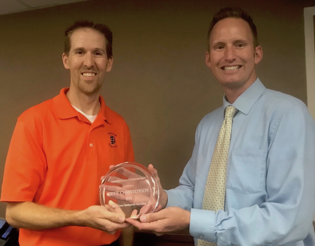 Christensen receiving award