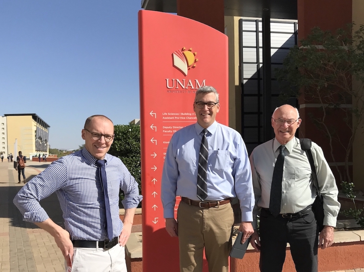 ISU faculty posing in front of Namibia university