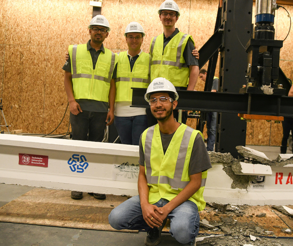 members of team RAMA in front of their beam