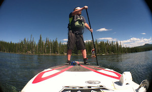 Person on standup paddle board