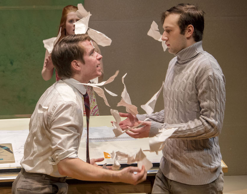 Photo of three actors in scene of play. 