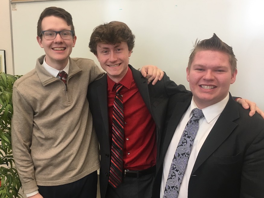 Photo of three debaters who placed.