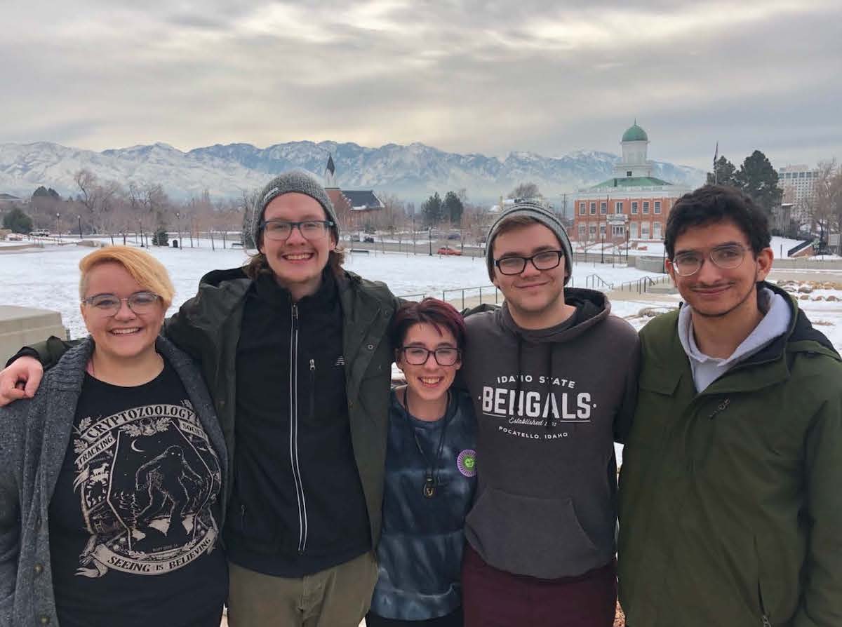 ISU debaters posing on the University of Utah campus.