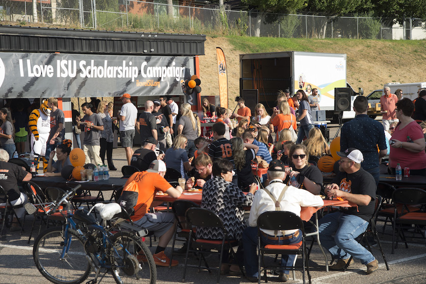 I Love ISU tailgate photo ... shows people walking, at tables