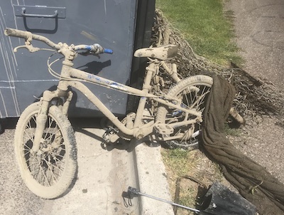 Bike and trash pulled from river