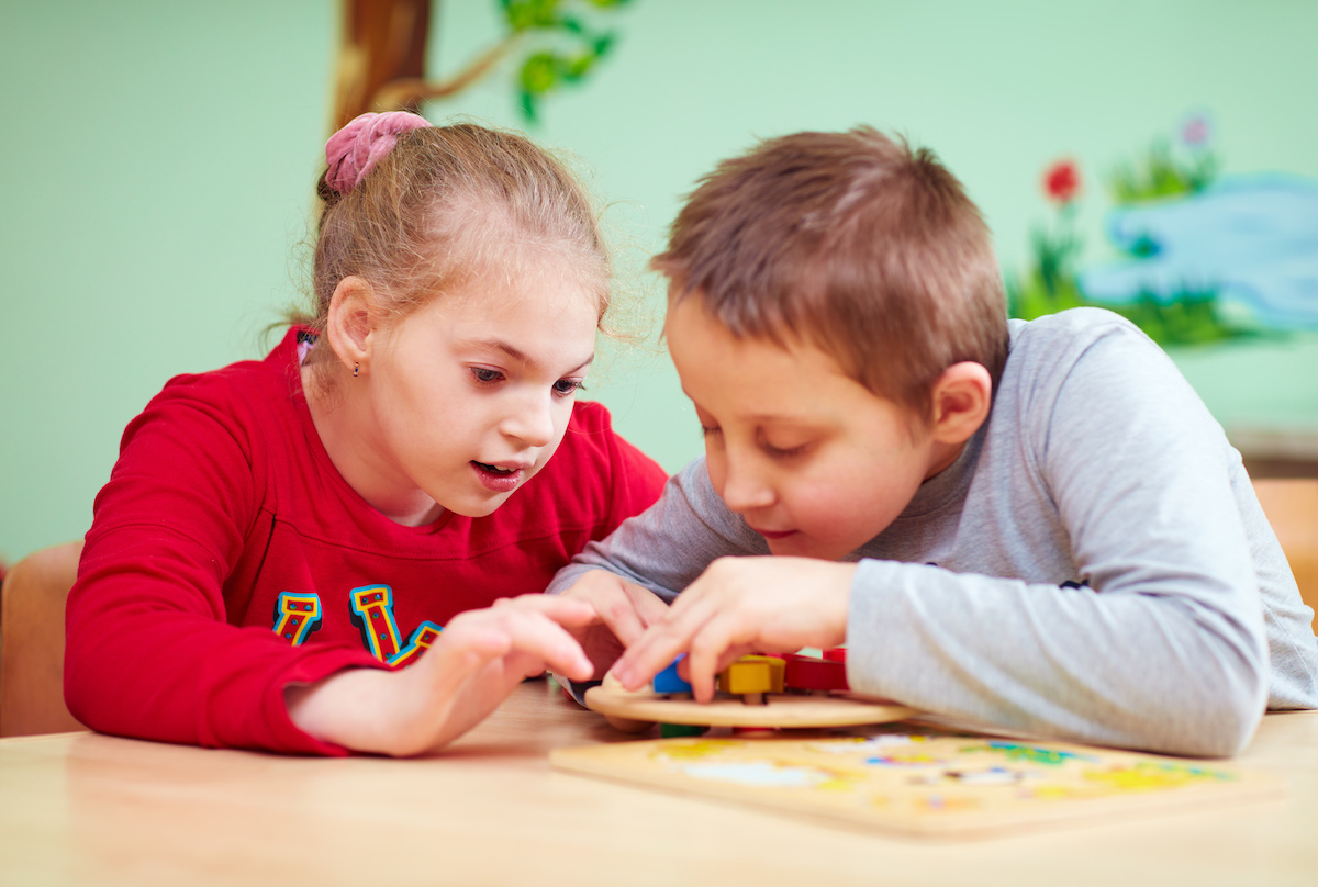 Two children in a learning group