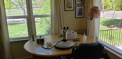 Microscope on table in house.