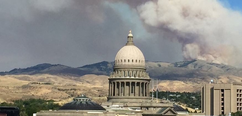Photo of Idaho State Capitol with wildfire smoke in the background