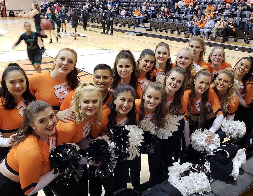 Photo fo Bengal Dance Team on Reed Gym floor during women's basketball game.