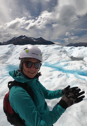 Student standing on glacier