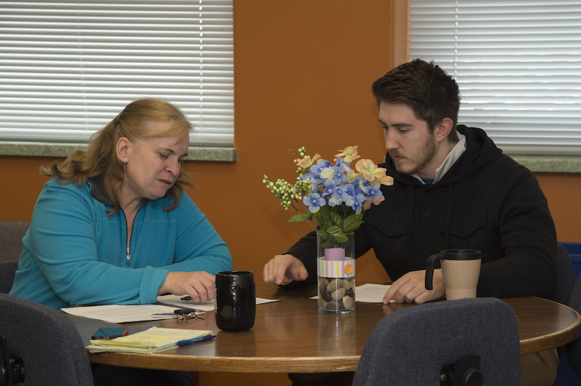 Man and woman at a table.