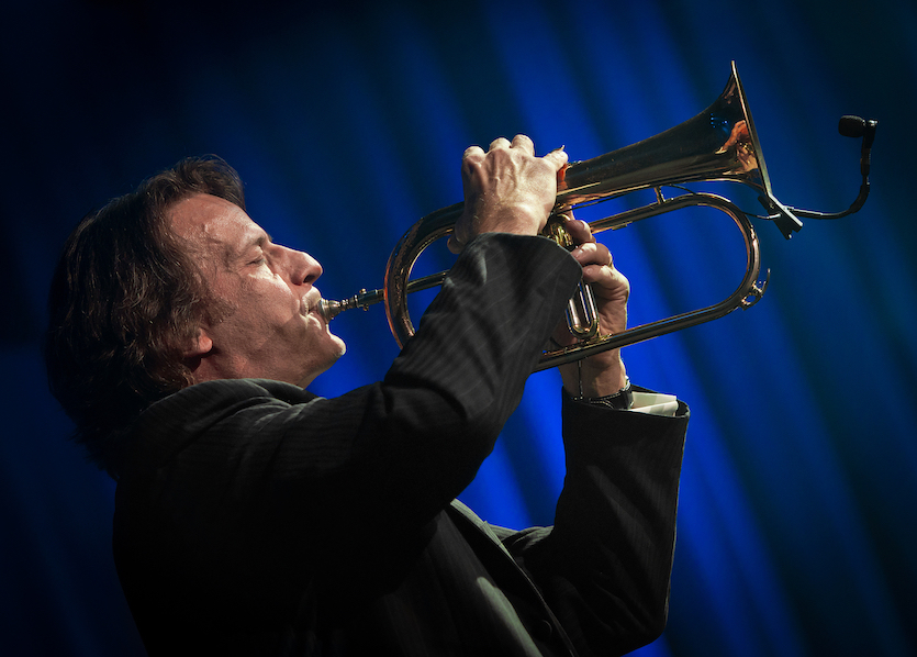 Kurt Bestor playing a trumpet