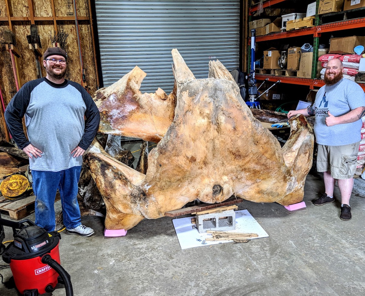 Tech Specialist Tim Gomes, left, and  IVL Manager Jesse Pruitt pose with the back portion of the blue whale cranium they scanned at Fort Bragg, California.
