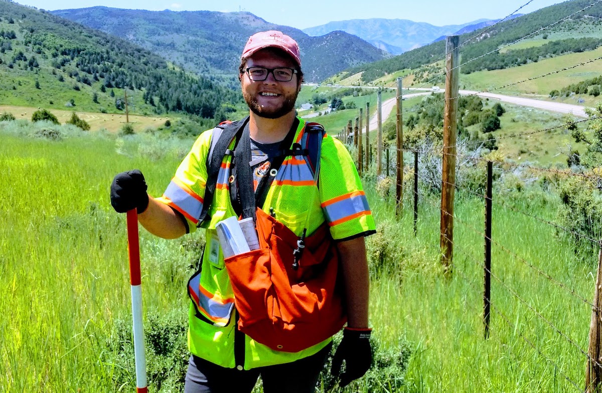 Cory Scoffield out in the field surveying