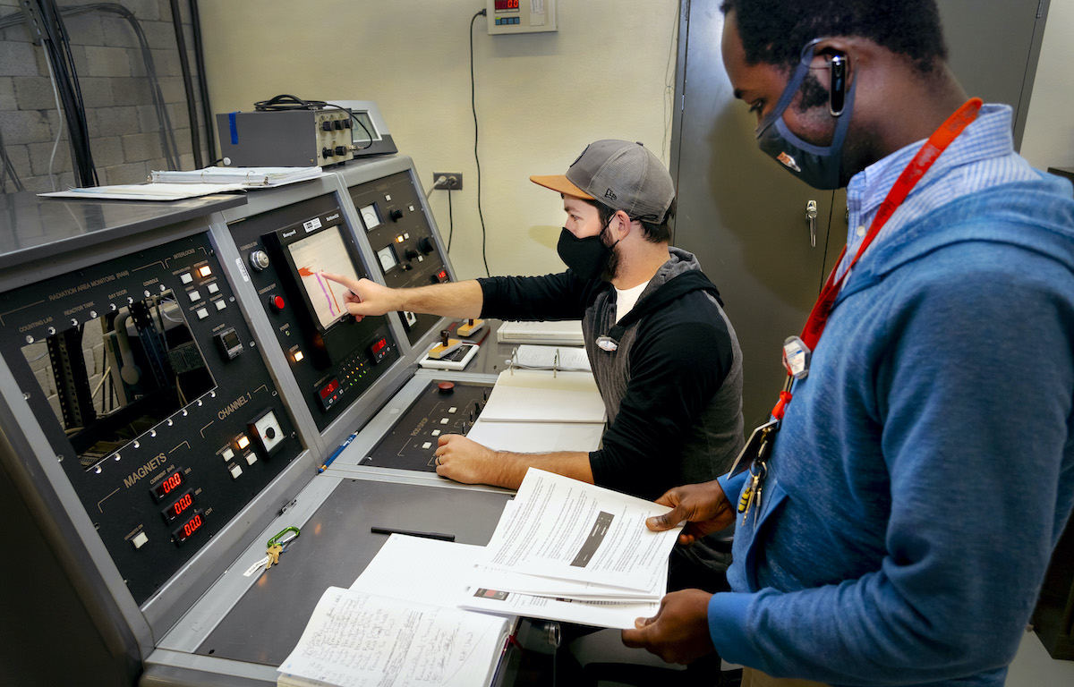 Students operating new console. 