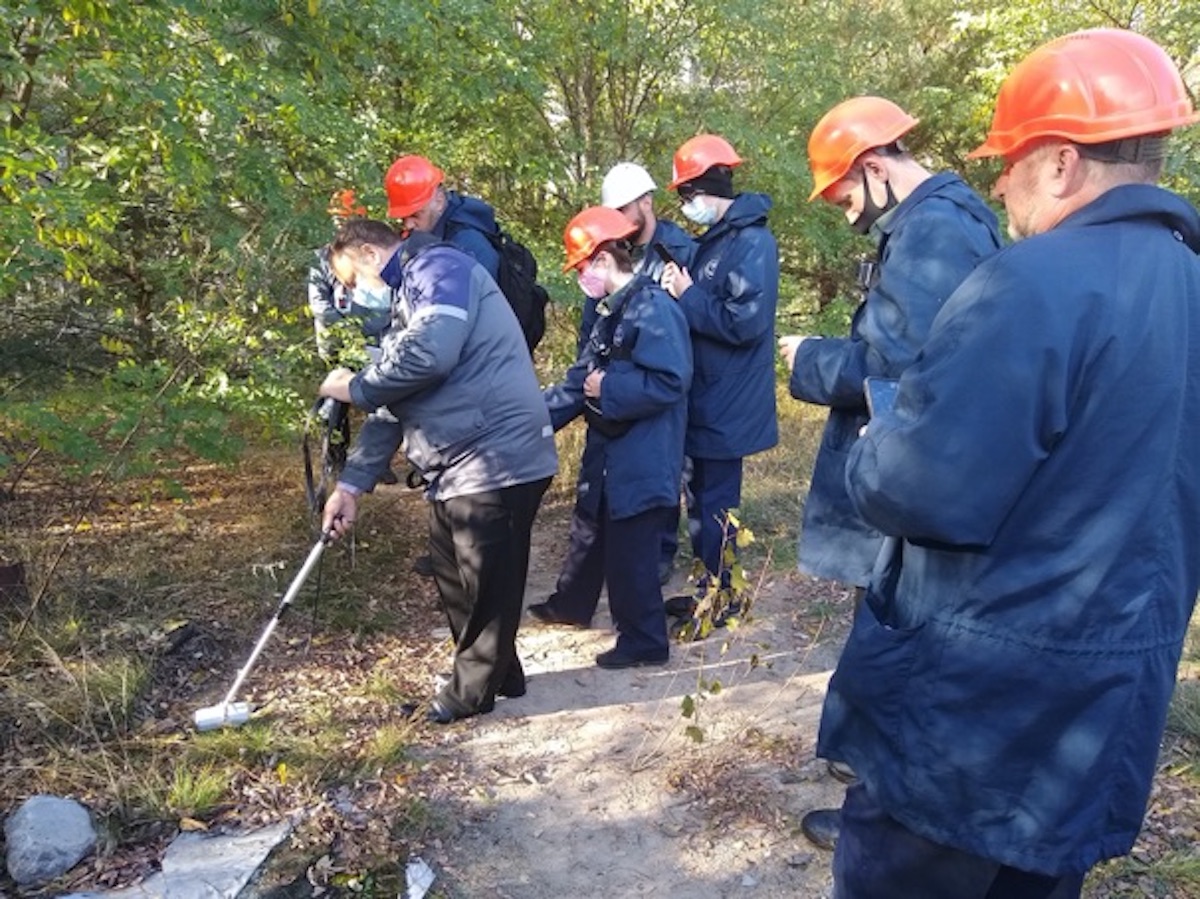 Chernobyl dosimetrist scanning the ground