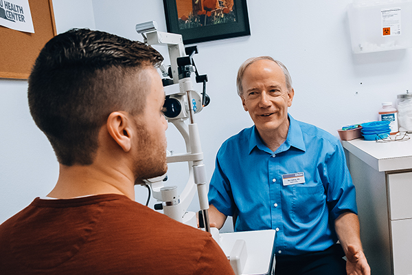 Dr. Solbrig in an appointment with a student