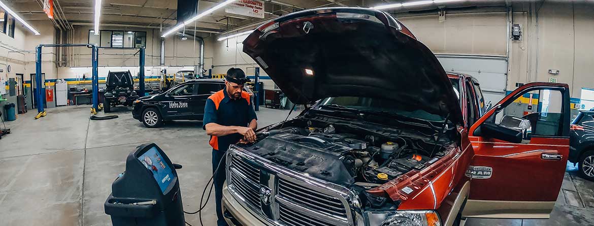 Brock Gunter demonstrating automotive techniques