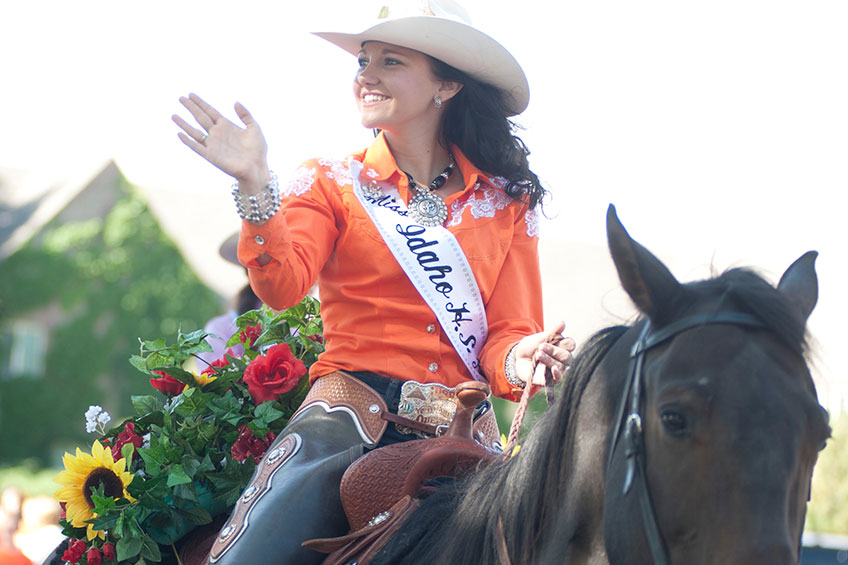 Rodeo queen riding her horse