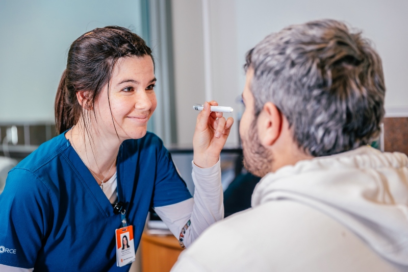 A School of Nursing student doing a medical exam on the Meridian campus.