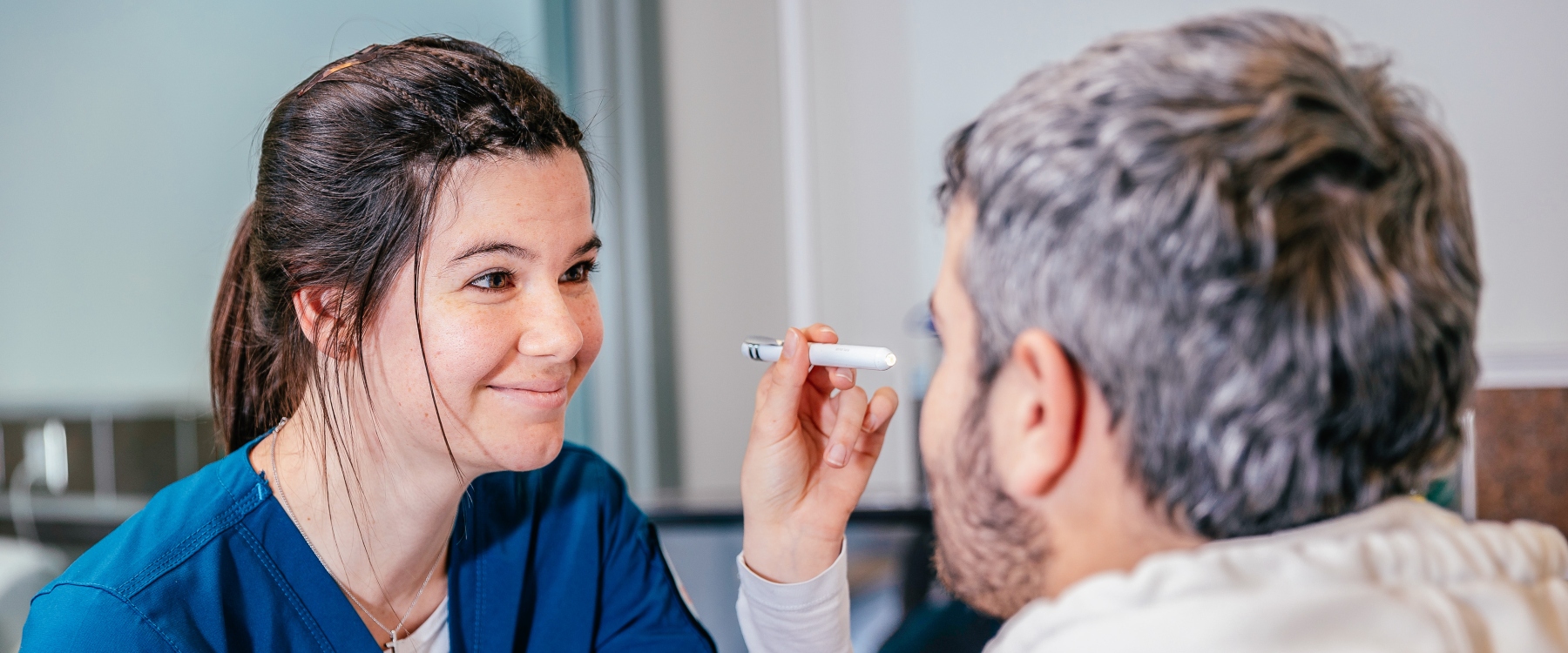 A School of Nursing student doing a medical exam on the Meridian campus.