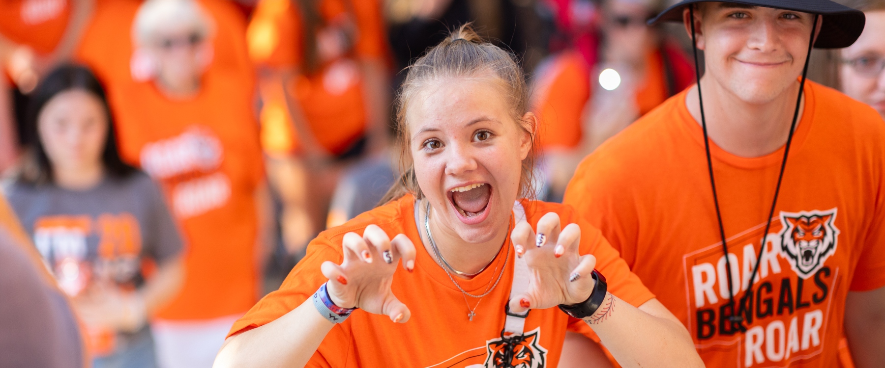 Spirited student posing at a game