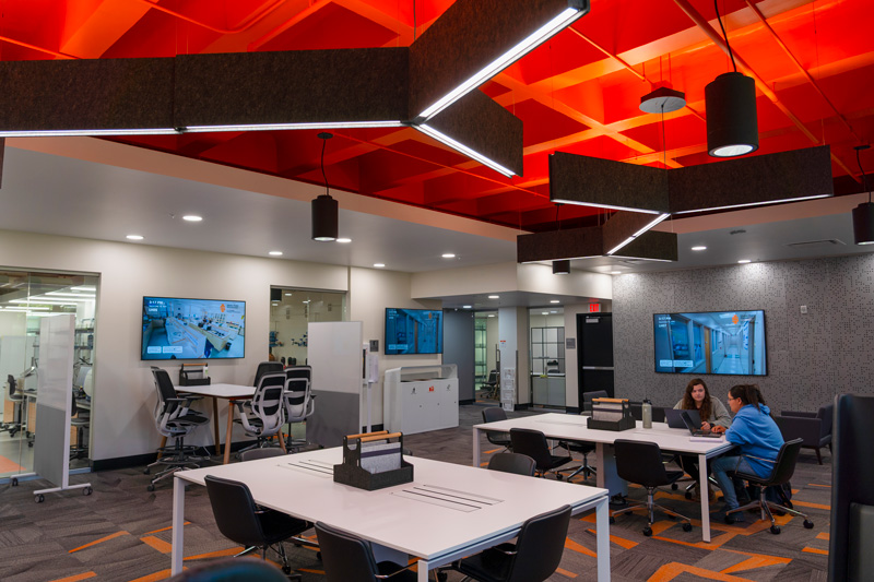 The newly renovated Leonard Hall has a variety of open study spaces with views of the pharmacy laboratories.