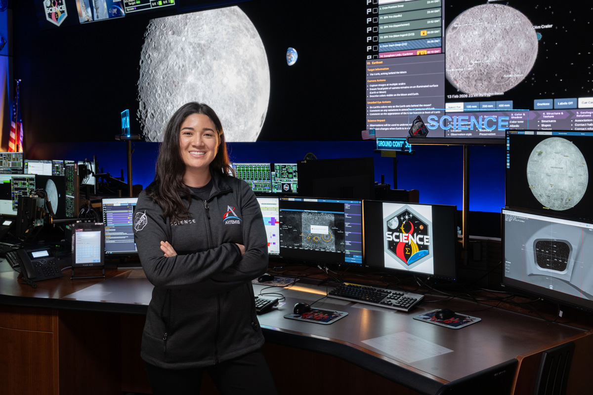 Artemis science officer, Angela Garcia, stands at the new SCIENCE console in the Mission Control Center at NASA’s Johnson Space Center in Houston. Credits: NASA/Josh Valcarcel