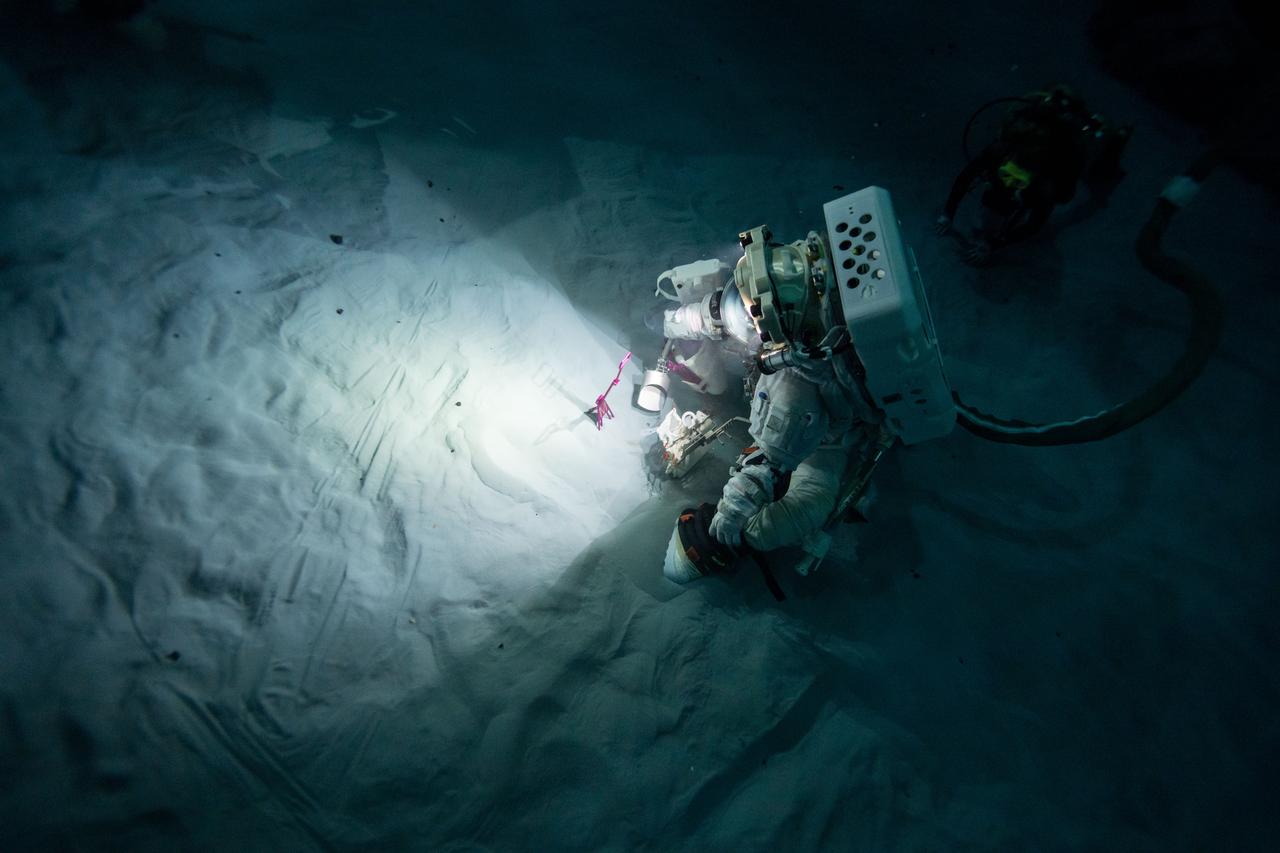 Angela Garcia carries out a lunar training development run at NASA’s Neutral Buoyancy Laboratory (NBL) in Houston. Credit: NASA