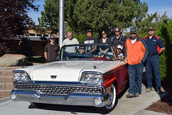 Students work on cars