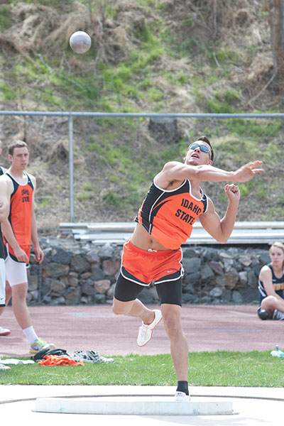 Shotput throwing in Davis field