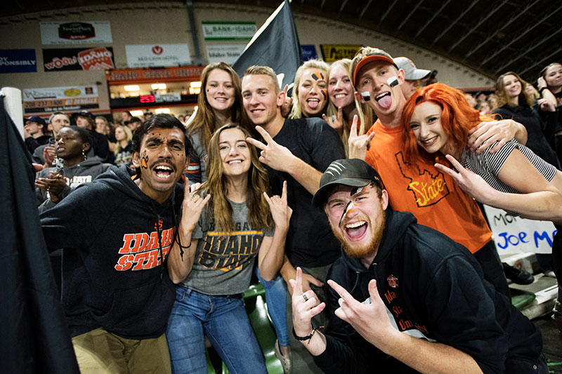 Students roaring at a football game