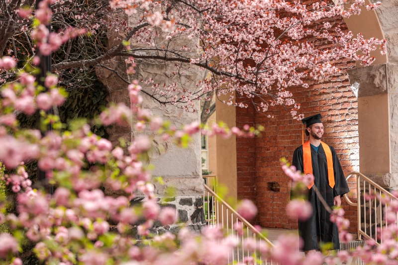 Graduating student at March through the Arch