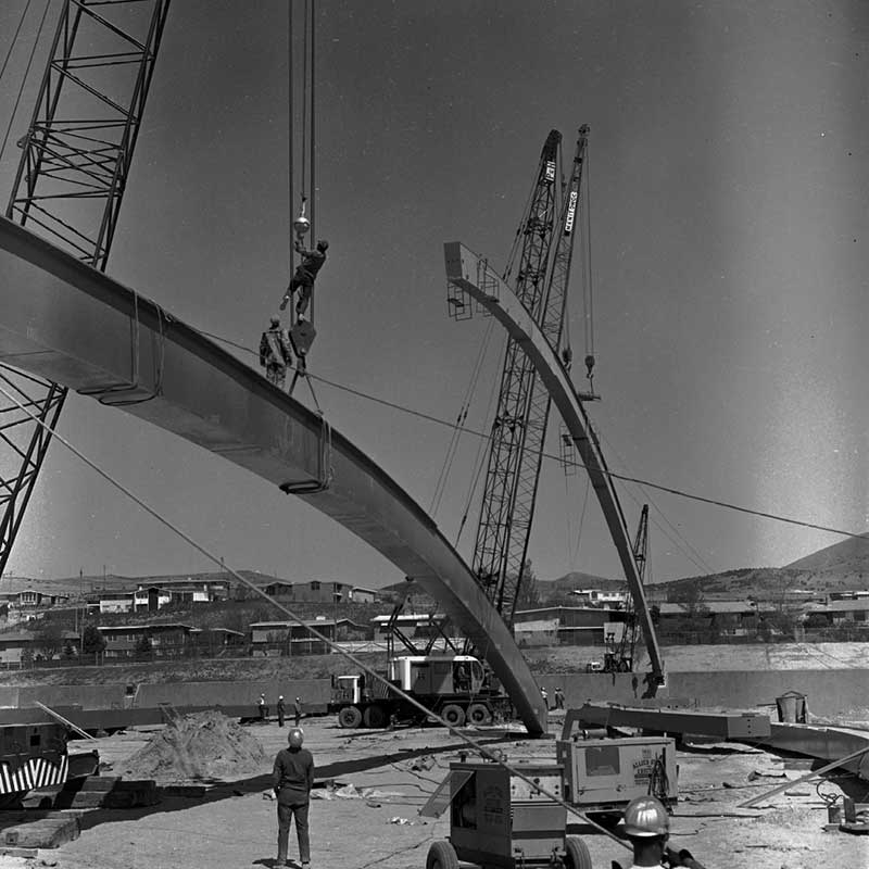 Construction workers building Holt Arena