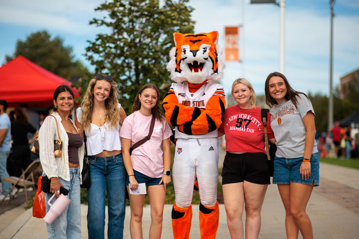 Benny the Bengal celebrates the ISU 2026 block party with students