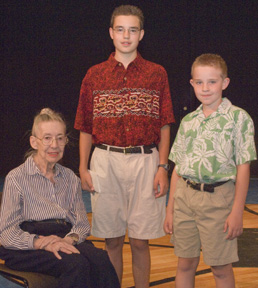 From left, Beverly Bistlines, Dirk Stahlecker and Kip Stahlecker on the stage of the Bistline Theatre.