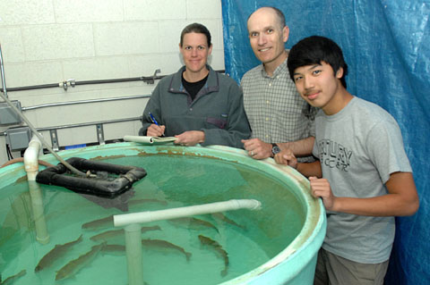 From left, Fleischmann, Rodnick and Century student Ben Devaud, at a Rodnick fish tank.