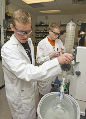 Pictured are Andrew Baker, foreground, and Josh Peterson, working on a Project SEED endeavor.