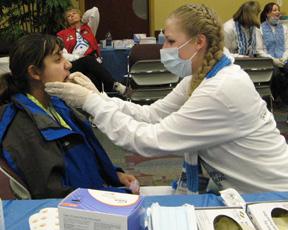 ISU student Karynn Abrams works on a Special Olympic athlete in Boise.