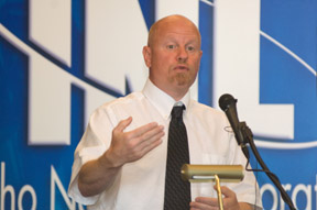 ISU chemistry chair Robert Holman spoke at the INL press conference honoring Pak and Rodriguez.