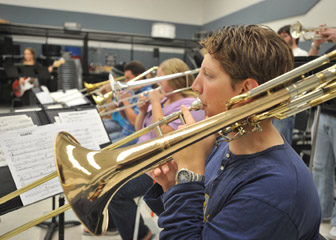 Trombonist Alex Daigh in rehearsal for ISU Jazz Bands concert.
