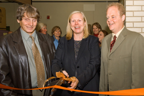 From left, Dennis Toney, director of the ISU ADA and Disability Resource Center, Deborah Hedeen, dean of the College of Education, and  Todd DeVries, ISU assistive technologies coordinator, cut the ribbon dedicating the new Broyles Assistive Technology Laboratory on Monday.
