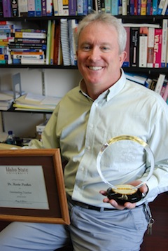 Kevin Parker with his awards.